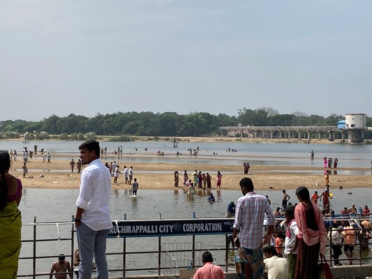 People bathing in river